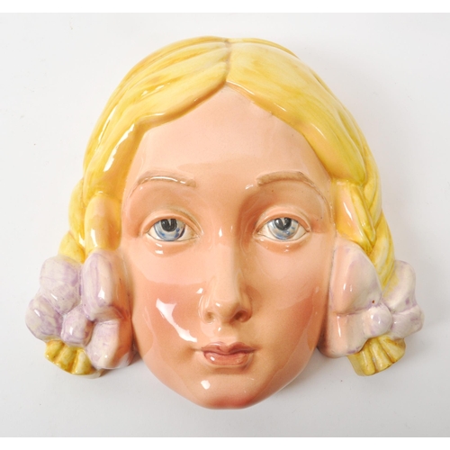 58 - Beswick - A mid-century glazed china porcelain wall hanging, no. 393, depicting a blonde girl with p... 