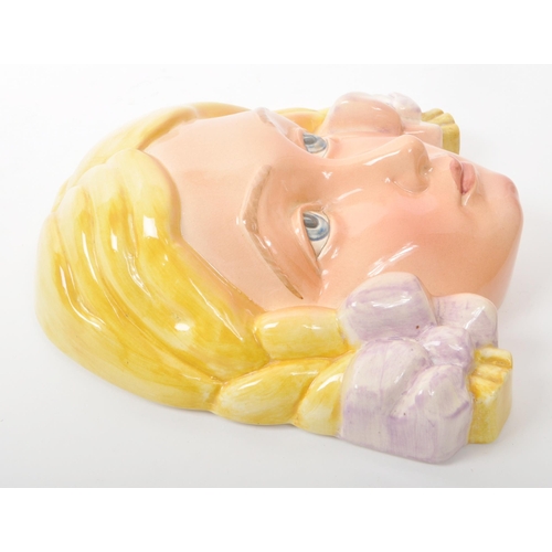 58 - Beswick - A mid-century glazed china porcelain wall hanging, no. 393, depicting a blonde girl with p... 