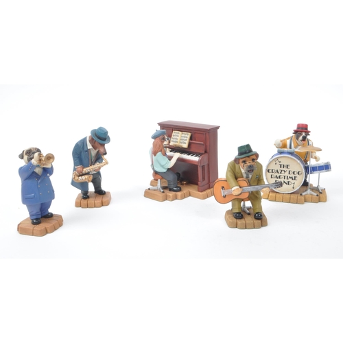 6 - Robert Harrop - A collection of five 1980s Doggie People figurines, to include: DP144 'The King' Cha... 