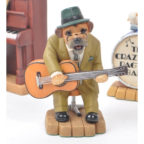 6 - Robert Harrop - A collection of five 1980s Doggie People figurines, to include: DP144 'The King' Cha... 