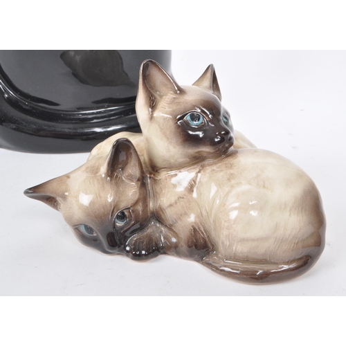 60 - Beswick - Two 20th-century glazed porcelain cat figures, comprising of a sitting black cat, no. 1561... 