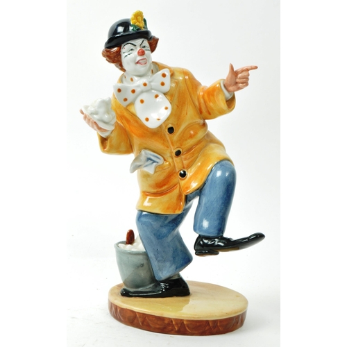 61 - Royal Doulton - A vintage 1970s porcelain 'The Clown' figurine no. HN 2890, with a glazed finish. Ha... 