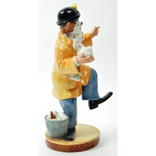 61 - Royal Doulton - A vintage 1970s porcelain 'The Clown' figurine no. HN 2890, with a glazed finish. Ha... 