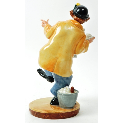 61 - Royal Doulton - A vintage 1970s porcelain 'The Clown' figurine no. HN 2890, with a glazed finish. Ha... 