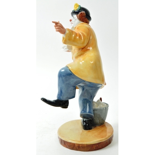 61 - Royal Doulton - A vintage 1970s porcelain 'The Clown' figurine no. HN 2890, with a glazed finish. Ha... 