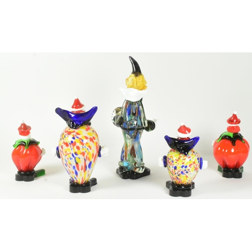 63 - A collection of five 20th-century Murano-style glass clown figures. Featuring a tall clown with a ta... 