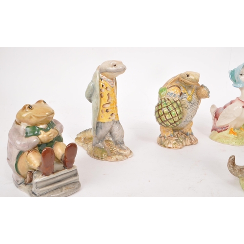 67 - Beswick - A collection of ten 20th century porcelain Beatrix Potter figures, including, 'Diggory Dig... 