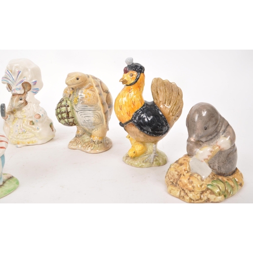 67 - Beswick - A collection of ten 20th century porcelain Beatrix Potter figures, including, 'Diggory Dig... 