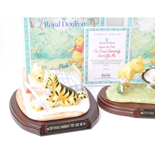 77 - Royal Doulton - Collection of four late 20th century Winnie-the-Pooh porcelain figurines, comprising... 