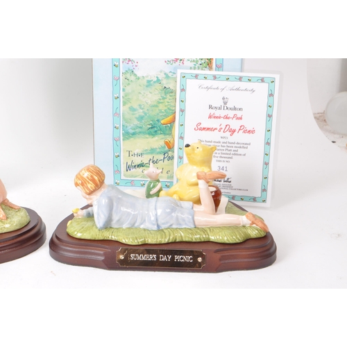 77 - Royal Doulton - Collection of four late 20th century Winnie-the-Pooh porcelain figurines, comprising... 