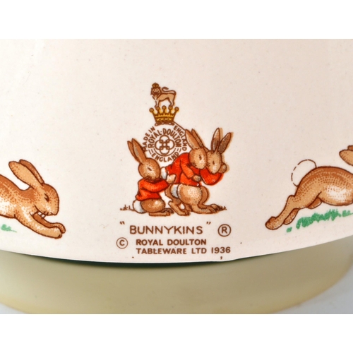 78 - Royal Doulton - Bunnykins - A 20th century porcelain 'Hey Jude' music box. Featuring a bunny in a pu... 