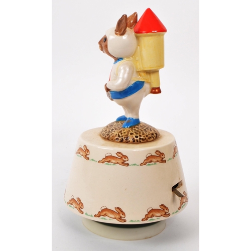 80 - Royal Doulton - Bunnykins - A 1984 'Fly Me To The Moon' porcelain figure music box, for the Golden J... 