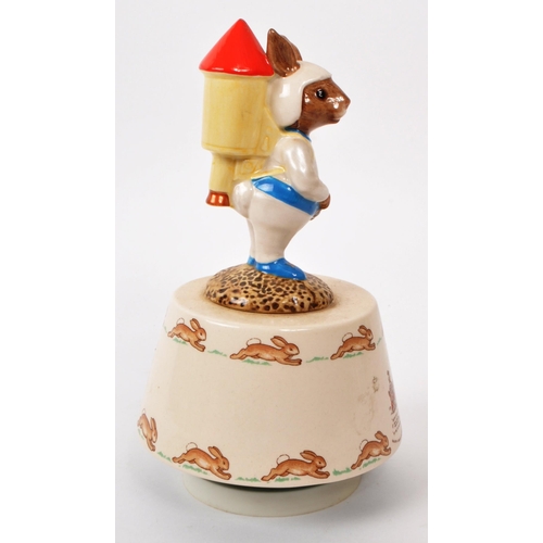 80 - Royal Doulton - Bunnykins - A 1984 'Fly Me To The Moon' porcelain figure music box, for the Golden J... 