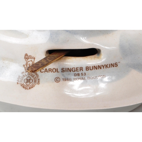 81 - Royal Doulton - Bunnykins - Three 20th-century Christmas music boxes. Comprising of two 'Carol Singe... 