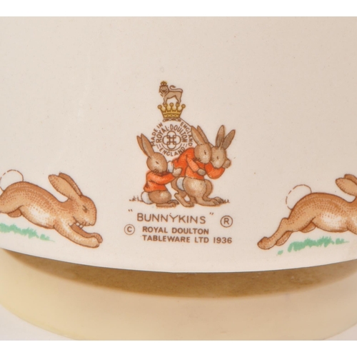 82 - Royal Doulton Tableware - Bunnykins - A 1980s porcelain 'Easter Parade' music box. Featuring 'Mrs Bu... 