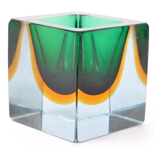 90 - A vintage mid 20th century studio art glass vase. The vase of cube form, with green and yellow colou... 