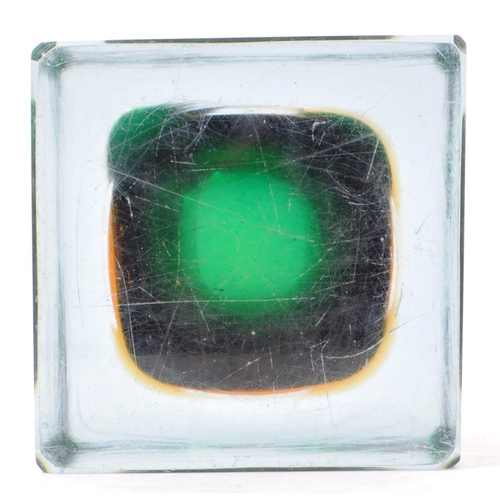 90 - A vintage mid 20th century studio art glass vase. The vase of cube form, with green and yellow colou... 