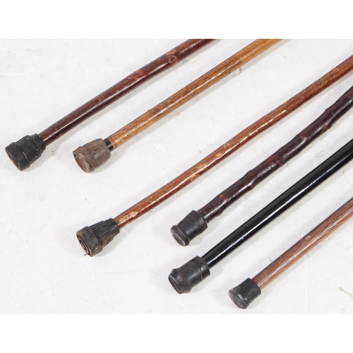 328 - Collection of vintage 20th century hand made walking sticks / swagger canes. Including wooden horse ... 