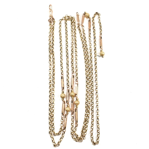 100a - A 19th century gold long guard muff chain. The necklace having belcher links interspaced with repous... 