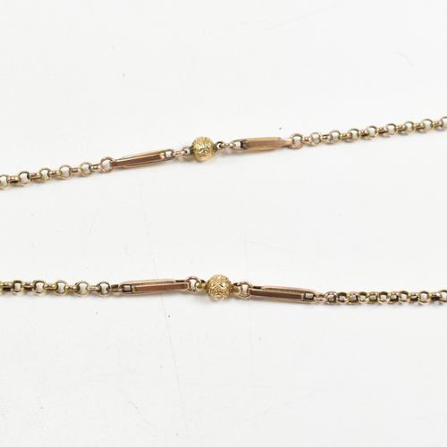 100a - A 19th century gold long guard muff chain. The necklace having belcher links interspaced with repous... 