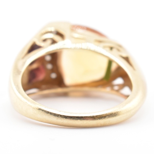 108 - A hallmarked 9ct gold citrine, garnet and diamond cocktail ring. The 9ct yellow gold ring set with a... 