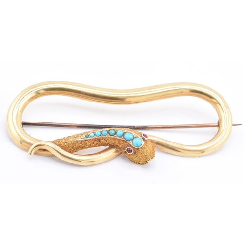 12 - A Victorian 15ct gold and turquoise snake brooch pin. The Victorian brooch pin in the form of a serp... 