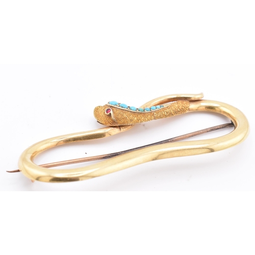 12 - A Victorian 15ct gold and turquoise snake brooch pin. The Victorian brooch pin in the form of a serp... 