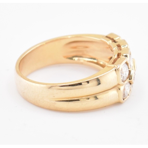 120 - An 18ct gold and diamond cluster ring. The 18ct yellow gold ring set with two rows of round brillian... 