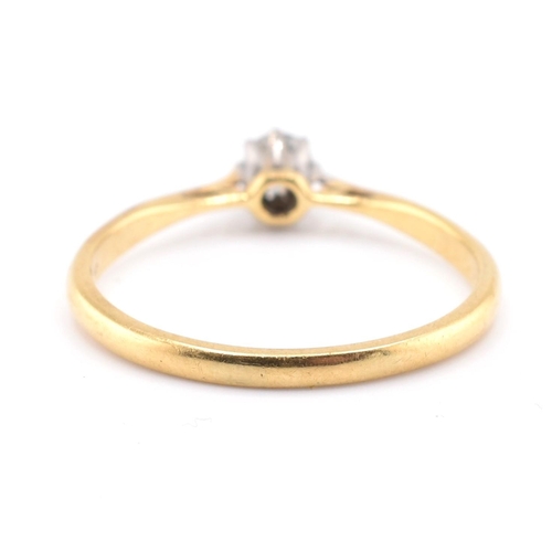 124 - An 18ct gold, platinum and diamond solitaire ring. The 18ct yellow gold ring set with a single eight... 