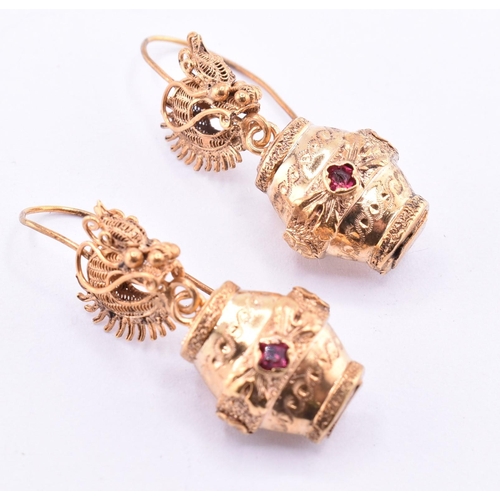 125 - Two pairs of pendant earrings. The earrings to include a pair of antique yellow metal and gem set pe... 