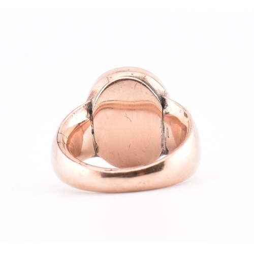 126 - A 19th century gold intaglio seal ring. The rose gold ring having an oval lava intaglio depicting th... 