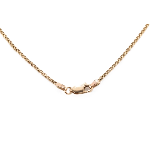 130 - A hallmarked 9ct gold chain necklace. The 9ct yellow gold wheat link chain having a lobster claw cla... 