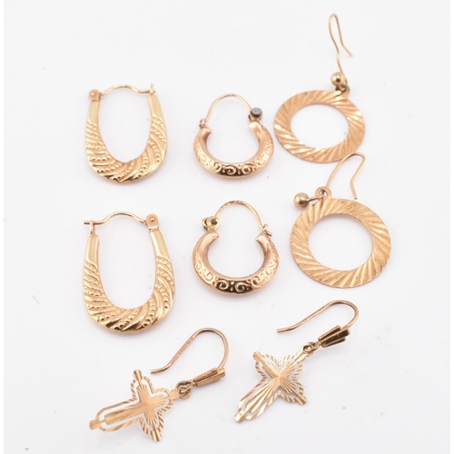 131 - Four pairs of 9ct gold earrings. The earrings to include a pair of hallmarked 9ct gold engraved hoop... 