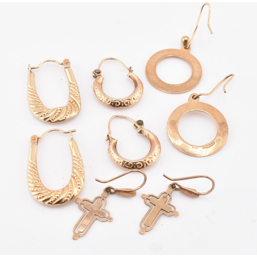 131 - Four pairs of 9ct gold earrings. The earrings to include a pair of hallmarked 9ct gold engraved hoop... 