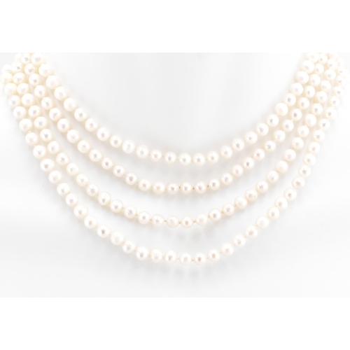 134 - A single strand pearl necklace. The pearl necklace comprised of round pearls measuring 0.5cm x 0.5cm... 