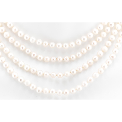 134 - A single strand pearl necklace. The pearl necklace comprised of round pearls measuring 0.5cm x 0.5cm... 