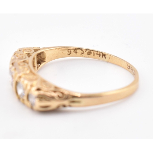 143 - A hallmarked 18ct gold and diamond five stone ring. The 18ct yellow gold ring set with five graduati... 