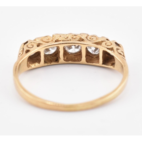 143 - A hallmarked 18ct gold and diamond five stone ring. The 18ct yellow gold ring set with five graduati... 