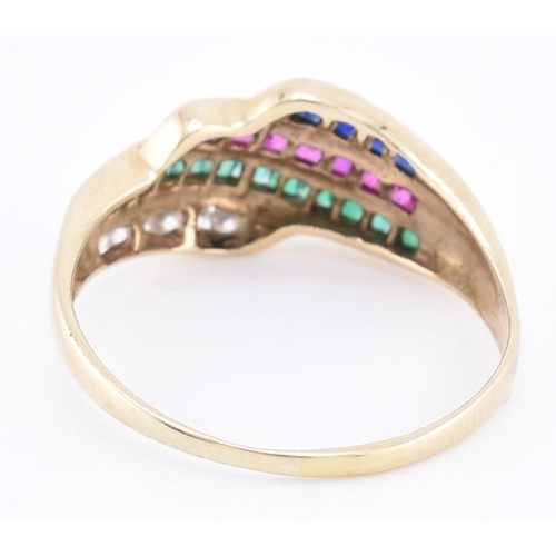 147 - A 9ct gold diamond, ruby, emerald and sapphire ring. The 9ct yellow gold ring set with a row of six ... 