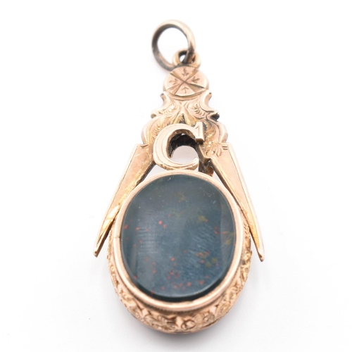 150a - A 19th century Masonic fob pendant. The fob pendant set with bloodstone with a carved hardstone inta... 