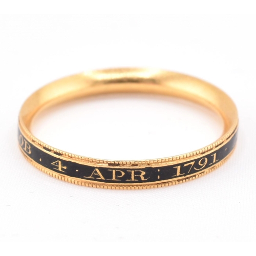 152 - An antique Georgian gold and enamel decorated mourning ring. The ring decorated with black enamel in... 