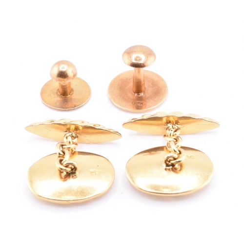 155 - A pair of 18ct gold marked torpedo cufflinks and 2 button studs. All marked 18ct. Total weight 10.25... 