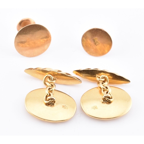 155 - A pair of 18ct gold marked torpedo cufflinks and 2 button studs. All marked 18ct. Total weight 10.25... 