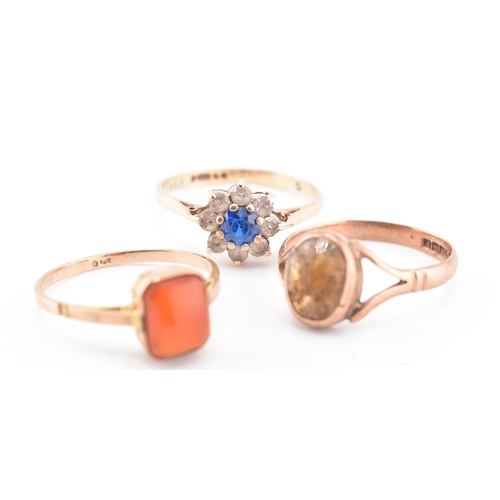 159 - Three 9ct gold and gem set rings AF. The lot to include a hallmarked 9ct yellow gold and gem set clu... 