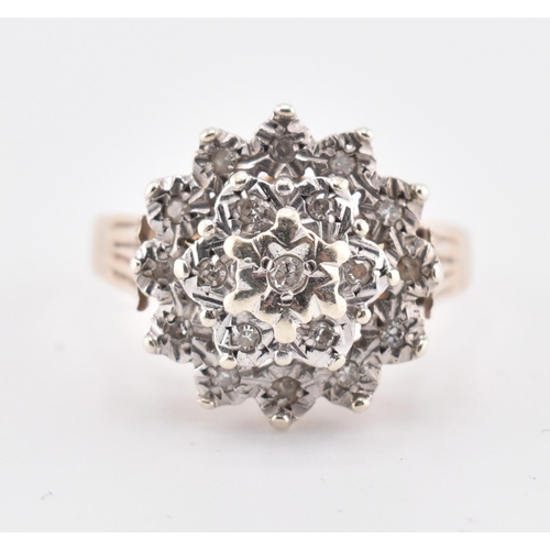 162 - A hallmarked 9ct gold and diamond cluster ring. The 9ct yellow gold ring set with a cluster of ninet... 