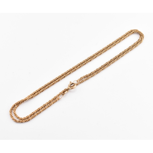 170 - A 9ct gold chain necklace. The 9ct gold chain necklace having a twisted weaved design to spring ring... 