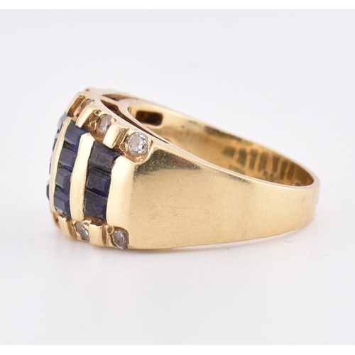 172 - A 14ct gold blue and white sapphire dome ring. The yellow gold ring five rows of calibre blue sapphi... 