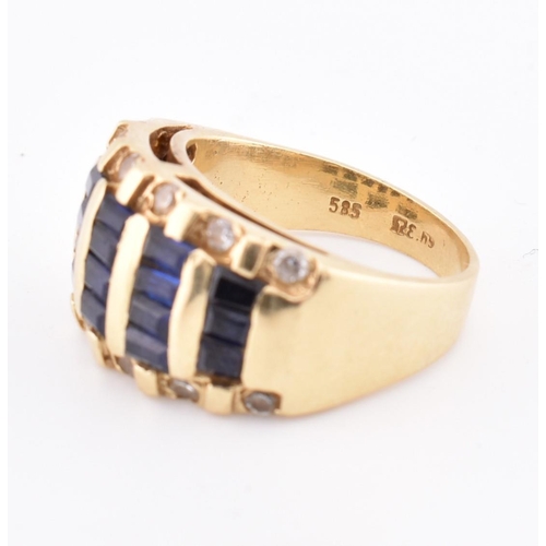 172 - A 14ct gold blue and white sapphire dome ring. The yellow gold ring five rows of calibre blue sapphi... 