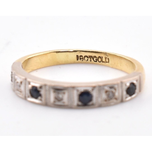 174 - 18ct gold sapphire and diamond half hoop ring. The ring having three flush set round cut sapphires i... 