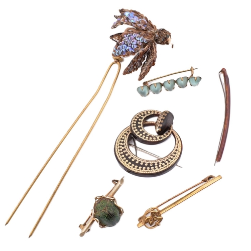 181 - An assorted of antique jewellery. The lot to include a 19th century pique work round brooch pin. A 1... 